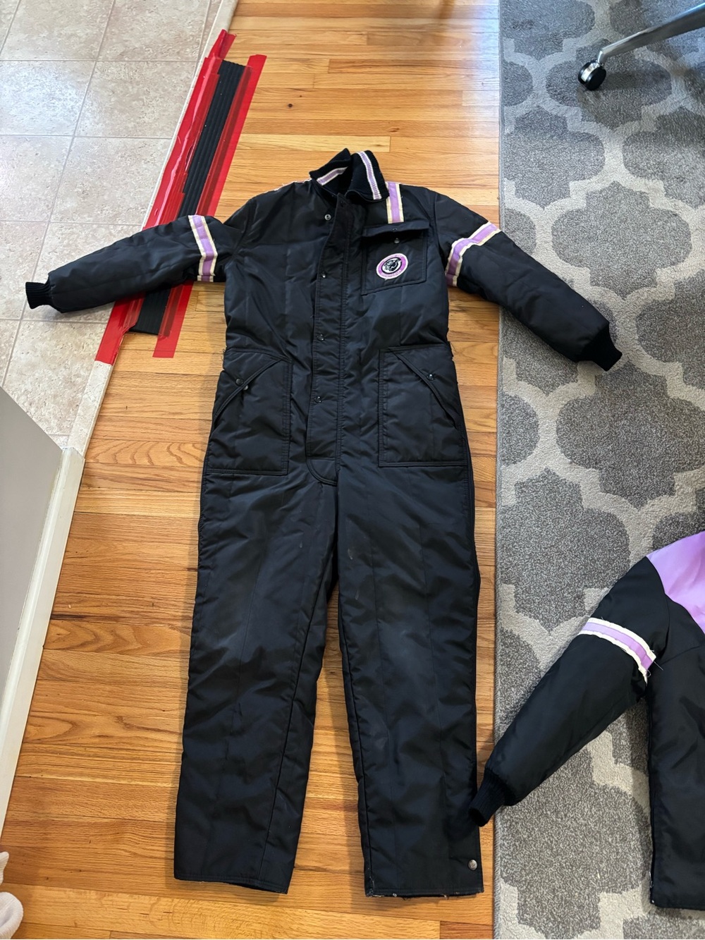 Vintage Arctic Cat Black One-Piece Ski Suit with Purple & White Trim